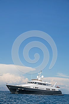 Luxury large super or mega motor yacht in the blue sea.