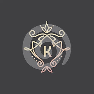 Luxury linear shield with floral monogram letter K logotype