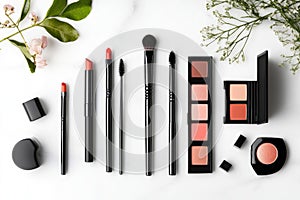 Luxury makeup set on marble table: brushes, lipsticks, and eyeshadows for a chic look