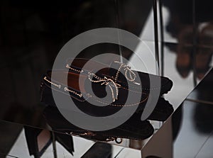 Luxury man`s shoes in the shop window