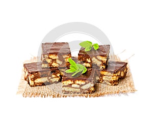 Luxury millionaires shortbread cookie with mint leaves isolated
