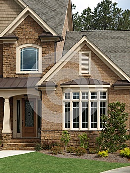 Luxury Model Home Exterior front door bay window