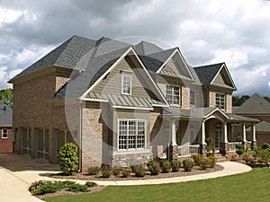 Luxury Model Home Exterior stormy weather angle