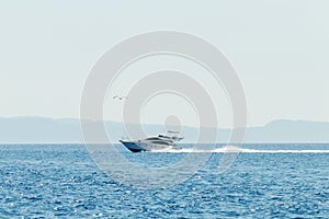 Luxury motor boat cruising in blue sea, Summer vacation