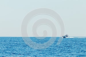 Luxury motor boat cruising in blue sea, Summer vacation