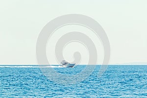 Luxury motor boat cruising in blue sea, Summer vacation