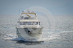 Luxury motor yacht cruising the Aegean sea
