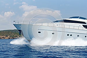 Luxury motor yacht cruising the Aegean sea