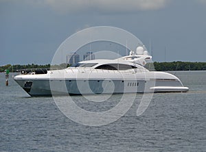 Luxury motor yacht idling off the Venetia Causeway on the Florida Intra-Coastal Waterway