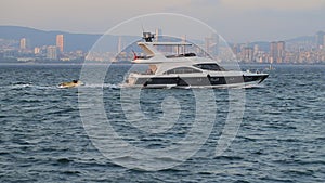 Luxury motor yacht at sunset
