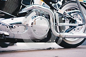 Luxury motorcycle close-up. Detail of a beautiful powerful chrome motorcycle parts. The concept of freedom and travel