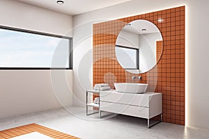 Luxury orange bathroom with mirror and bathtub