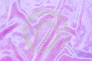 Luxury pink purple silk background. Rippled silk fabric, drapery cloth, or satin texture