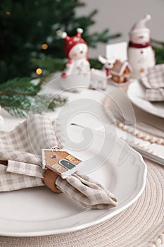 Luxury place setting with beautiful festive decor for Christmas dinner on white table, closeup