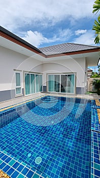 Luxury pool villa with tropical garden