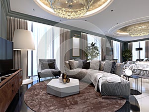 Luxury presidential suite with a bedroom and a large bed and a living room with a sofa and a TV stand