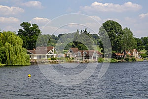 Luxury properties on the bank of the Thames at Henley-on-Thames in Oxfordshire, in preparation for the Royal Regatta