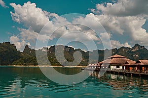 Luxury raft houses resort on Cheow Lan lake in Khao Sok National Park, Thailand. Postcard, poster, wallpaper