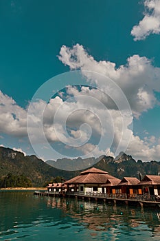 Luxury raft houses resort on Cheow Lan lake in Khao Sok National Park, Thailand. Postcard, poster, wallpaper