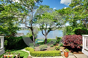 Luxury real estate lake view from home balcony.