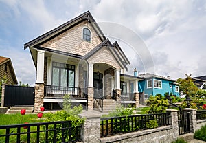 Luxury residential house with metal grid and gate in front