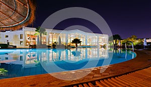 A luxury resort at night photo