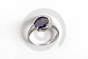 Luxury ring with blue sapphire isolated on white background