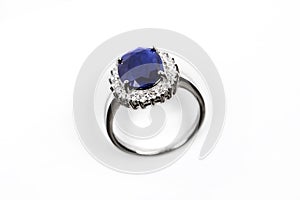 Luxury ring with blue sapphire isolated on white background