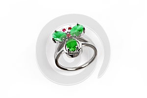 Luxury ring with green gem isolated on white background