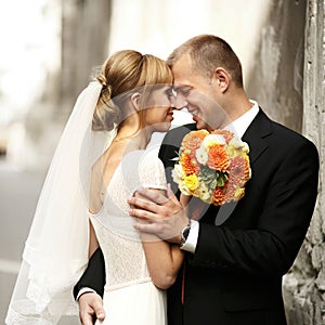 Luxury romantic happy bride and groom celebrating marriage on th