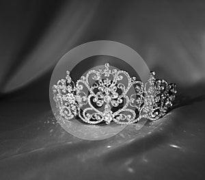 Luxury royal crown diadem with diamonds. Black and white photo,