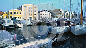 Luxury sailboats in Nyhavn harbor, water transport in Copenhagen city, travel