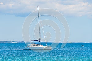 Luxury sailing catamaran in open sea