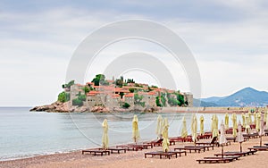 Luxury Sand Beach near Island and Resort Sveti Stefan, Montenegro. Balkans, Adriatic sea, Europe.
