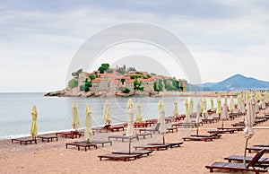 Luxury Sand Beach near Island and Resort Sveti Stefan, Montenegro. Balkans, Adriatic sea, Europe.