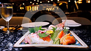 Luxury sashimi set with prawn, tuna, octopus, salmon, and more in luxury restaurant