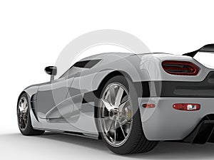 Luxury silver super sports car - rear wheel closeup shot
