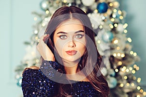 Luxury smiling woman. Christmas party. Fashion evening makeup. Happy new year