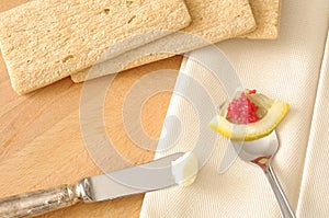 Luxury snacks, elegant knife for butter and red lumpfish eggs in a spoon