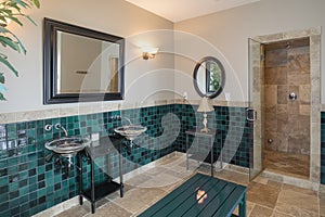 Luxury spa bathroom with limestone tile and shower photo