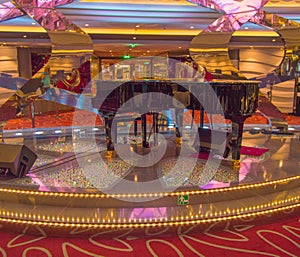 Luxury sparkling interior with Grand piano and floor with rhinestones on cruise liner MSC Meraviglia, 8 October 2018 photo