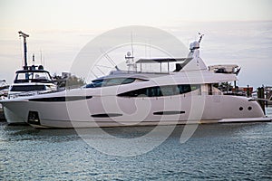 Luxury speed yachts near tropical island in Miami