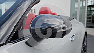 Luxury sport car side-view mirror with carbon cover and turn signal