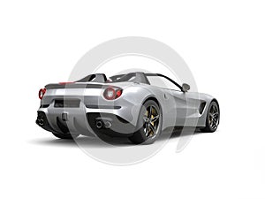 Luxury sports car with silver paintjob - back view studio shot