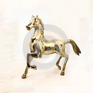 luxury statue of a horse stallion sculpted in gold