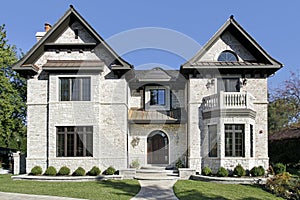 Luxury stone home with balcony