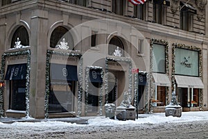 Luxury Stores along Fifth Avenue in Midtown Manhattan of New York City after a Snowstorm