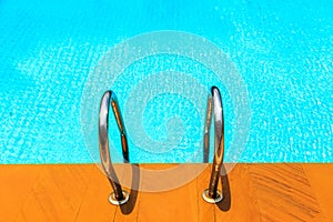 Luxury swimming pool with the blur background of water