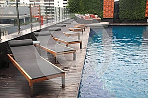 Luxury Swimming pool with long chairs