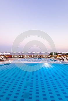 Luxury Swimming Pool at Sunrise in Hotel Resort, Rhodes, Greece